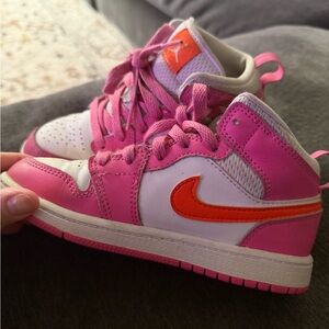 Nike Kids Pink and White Sneakers with Orange Swoosh